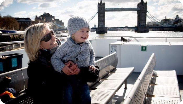 A mother with her child enjoy the Thames Cruise